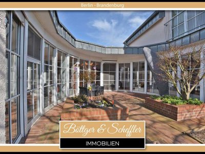 Einzigartiges Niedrigenergie-Architektenhaus mit beeindruckendem Atrium