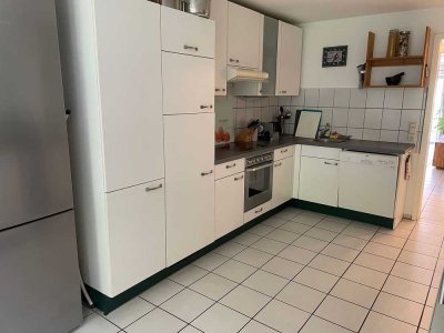 Sonnige 3 Zimmer-Wohnung mit Balkon und Garten sowie großer Wohnküche in Tübingen-Lustnau
