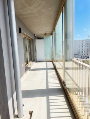 Erstbezug - Modern und lichtdurchflutet: 2-Zimmer-Wohnung mit XXL-Loggia (3.OG) mit TG-Stellplatz