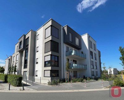 Attraktiv und modern - Neuwertige 2-ZKB-EG-Wohnung mit Terrasse, Tiefgarage und Aufzug - Sofort frei