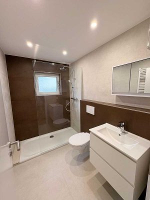 Hochwertig kernsanierte 3-Zimmer-Erdgeschosswohnung mit Balkon in zentraler Lage