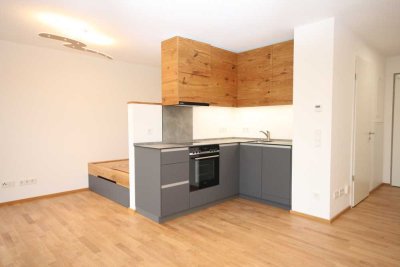 Luxuriöse KFW55-Wohnung mit eigenem Garten und TG-Stellplatz mit Wallbox - hochwertig teilmöbliert