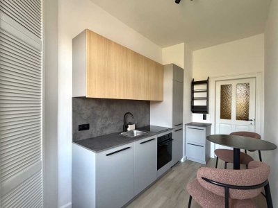 Erstbezug nach Renovierung | Helle 2-Zimmer-Wohnung mit neuer EBK & Garten