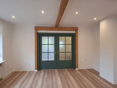 100 m² Einliegerwohnung mit eigenem Eingang, Garage und Gartennutzung in Cölbe-Schwarzenborn