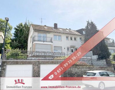 Dreifamilienhaus in Trier-Olewig: Garten, 2 Garagen, voll unterkellert