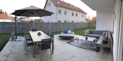 Stilvolle  4-Zimmer-Terrassenwohnung mit privatem Garten & großer Terrasse