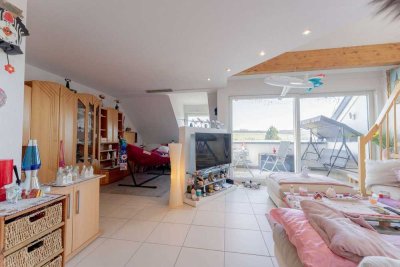 Exklusive Dachgeschosswohnung mit Garten, Terrasse & Balkon.