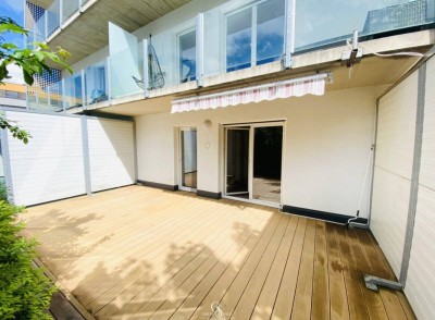 Drei-Zimmer-Gartenterrassen-Wohnung mit Tiefgaragenstellplatz