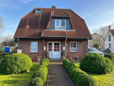 Charmante Dachgeschosswohnung - mit Terrasse und Garten -