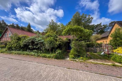 Sanierungsobjekt mit Herz: Bungalow mit 2 Schlafzimmer einem Garten, Wintergarten & Carport