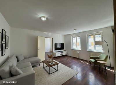 Ihr neues Zuhause im 17. – Charmante 2-Zimmer-Neubauwohnung mit Gemeinschaftsgarten