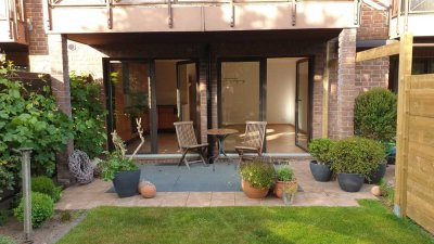 2-Zimmer-Wohnung, Erdgeschoß/Souterrain in Meerbusch-Büderich mit Garten