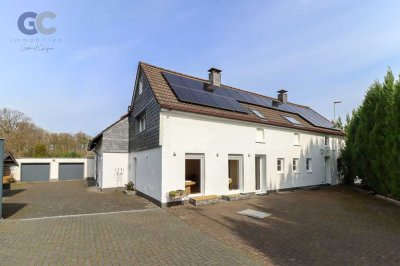Perfekte Harmonie: Modernes Mehrfamilienhaus mit 3 Wohneinheiten in Top-Lage