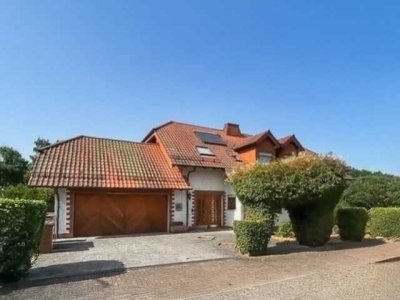 Hochwertiges Dreifamilienhaus mit Doppelgarage auf Traumgrundstück in Bann