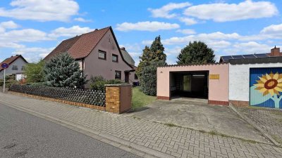 Doppelhaushälfte mit Aus-und Erweiterungspotential & großem Garten & Garage