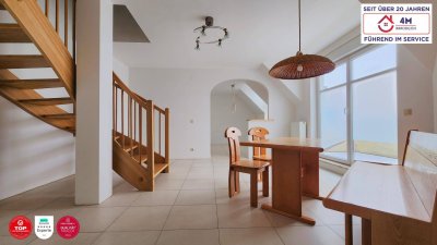 Helle Dachgeschoss-Maisonette mit zwei traumhaften Terrassen und Tiefgaragenplatz