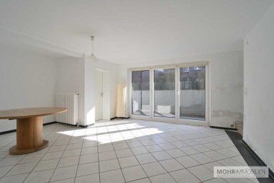 Investitionschance im Kurort: Sanierungsbedürftige Souterrain-Wohnung mit Charme