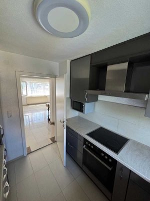 Schöne 3-Zimmer-Wohnung mit Wintergarten, Einbauküche & Garten