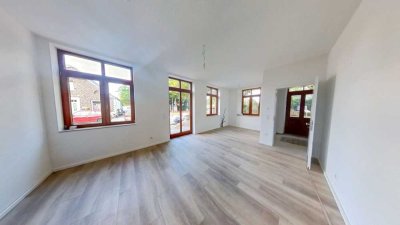 Wohnen mit Geschichte in denkmalgeschütztem Wohnhaus - Im geräumigen EG - mit Terrasse