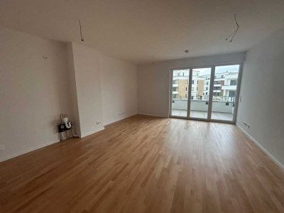 Erstbezug: Moderne 2-Zimmer-Wohnung mit Balkon, EBK  & TG
