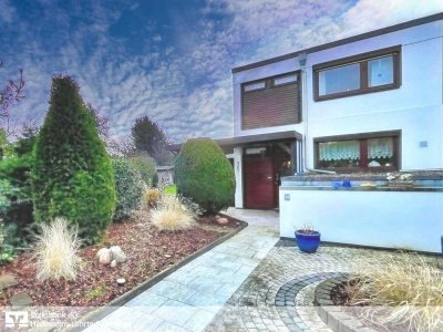Isernhagen HB: Charmantes Reihendendhaus mit großem Garten in begehrter Lage