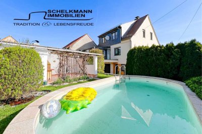 Modernes Einfamilienhaus mit Wintergarten und Pool