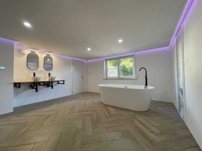 Modernes, energieeffizientes Einfamilienhaus auf drei Etagen mit insgesamt fünf Zimmern