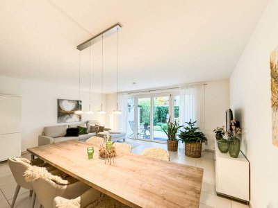 Schicke Gartenwohnung mit Einbauküche und Tiefgaragenstellplatz