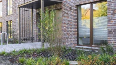 Moderne 2-Zi.-EG-Wohnung mit S/W-Terrasse, EBK & Stellplatz