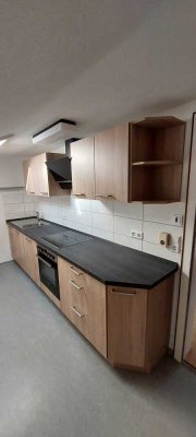 Geschmackvolle 2,5-Zimmer-Dachgeschosswohnung mit Balkon und Einbauküche in Stein