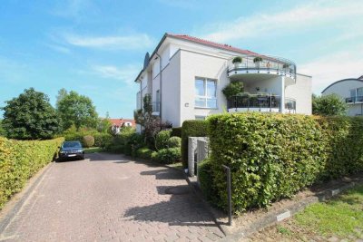 Zu Fuß zum Strand: Gepflegte Souterrainwohnung mit Terrasse und Stellplatz in ruhiger Sackgassenlage