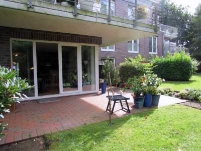 Sanierte 2-Zimmer-Wohnung mit Terrasse mit Blick ins Grüne und optional Tiefgaragen-Stellplatz