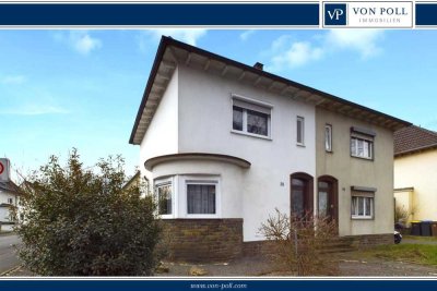 Charmante Doppelhaushälfte mit Südgarten und Carport