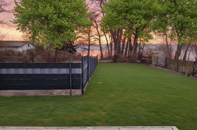 Haus am See: 3-Raum-Wohnung mit Seeblick und (Winter)Garten (EG)