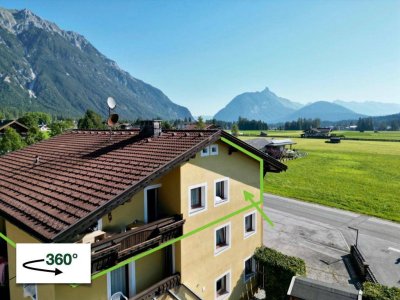 Wohnen im Grünen: Einzigartige Dachgeschosswohnung mit vielseitigem Potenzial