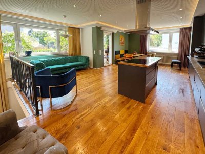 Preiswerte 3-Zimmer-EG-Wohnung mit gehobener Innenausstattung mit Balkon, Garten + 1,5 DG-Wohnung