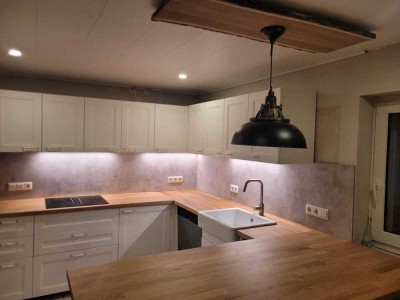 Komplett renoviert Eigentumswohnung mit Balkon und Garten in Lübbecke
