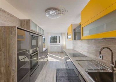 Einzugsbereite, moderne 3,5 Zimmer Wohnung mit EBK, Balkon und Garage