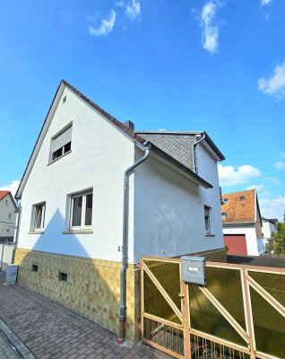 Einfamilienhaus mit Nebengebäude und Garten zu verkaufen