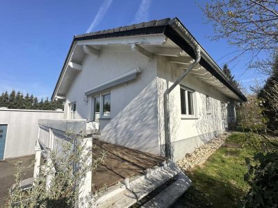 Helle Erdgeschosswohnung mit hohen Decken und sonniger Terrasse