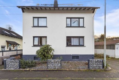 **Attraktives Mehrfamilienhaus in Gummersbach - Ihre ideale Kapitalanlage mit 4 Wohneinheiten**