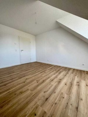 Neubau Dachgeschosswohnung in Mühlburg mit Flair