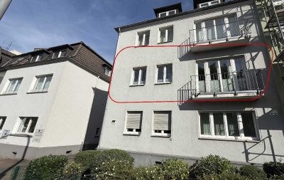 Charmante 3-Zimmer-Wohnung mit zusätzlichem Mansardenzimmer, Garage und Balkon