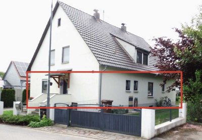Ihr Zuhause im Grünen: EG-Wohnung mit Garten & Garage im ZF-Haus.
