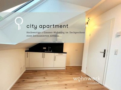 City-Refugium - Hochwertige 1-Zimmer-Wohnung im Dachgeschoss von kernsaniertem Altbau