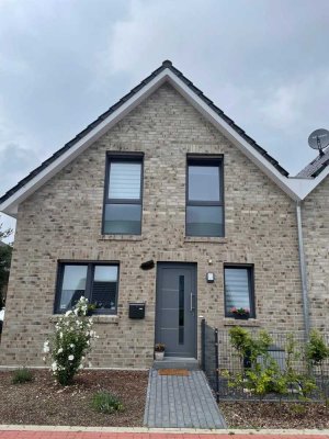 Neubau 2024: Hochwertige 4-Zimmer-Doppelhaushälfte mit Garten & Stellplätzen in Top-Lage Schüttorf