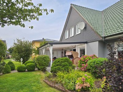 Vielseitiges Zuhause: Einfamilienhaus mit integrierter Gewerbemöglichkeit