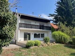 Haus in Lustadt mit 2 Wohnungen,3 Garagen  und tollem Garten