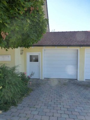 4-Zimmer-Wohnung mit Balkon und eigenem Garten mit Terrasse in ruhiger Siedlungslage