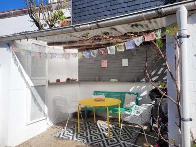 Charmante Wohnung mit großer Sonnenterrasse und Pergola